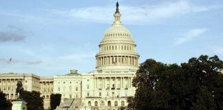 Deltek Maps $427 Billion of Federal Work for FY 2027 as Size Standards Face Rewrite US Federal building (Source Pixabay/DEZALB under CCO)