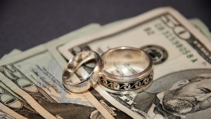 Wedding rings and money, Acquisition and merger Image credit Freeimages/Dani Simmonds