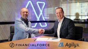 FinancialForce ANZ Managing Director Simon Peterson and Agilyx Group Chief Executive Officer John Catarinich shaking hands after officially signing the partnership agreement. (Image credit Agilyx)