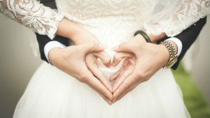 Kronos and Ultimate to merge Marriage wedding image credit pixabay/takmeomeo