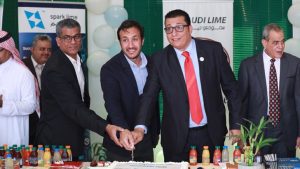 Saudi Lime Celebration - Joining in the cake cutting at the project launch party are, from left, Murthy Meduri, Infor Professional Services principal solution architect; Mostafa Aziz, Infor Professional Services senior project manager; and Ahmed Elawa, Saudi Lime CEO.