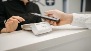 commercetools (credit image/https://www.pexels.com/photo/a-person-making-payment-using-smartphone-6812431/Pavel Danilyuk)