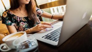 UKG (credit image/https://pixabay.com/photos/woman-laptop-desk-workspace-1851464/Pexels)