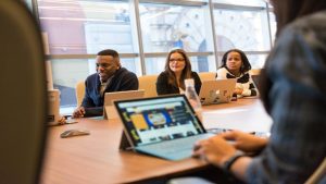 Simpplr achieves Workday Design Badge Integration (Credit image/https://www.pexels.com/photo/group-of-people-sitting-in-front-of-table-1181405/Christina Morillo)