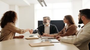 AI in recruitment: from hype to hard choices (credit image/https://www.pexels.com/photo/man-in-black-suit-jacket-sitting-beside-woman-in-brown-long-sleeve-shirt-4344860/ Edmond Dantès)