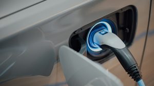 IoT SIM Cards: Unlocking New Features in Electric Vehicle (EV) Charging Stations - Photo by CHUTTERSNAP on Unsplash