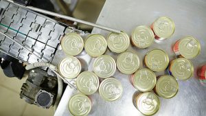 Food Processing: Opportunity - Image credit - Getty Images For Unsplash+ https://unsplash.com/photos/packed-tin-cans-with-fish-or-seafood-being-put-to-processing-line-in-factory-FeZXjbRNjyA